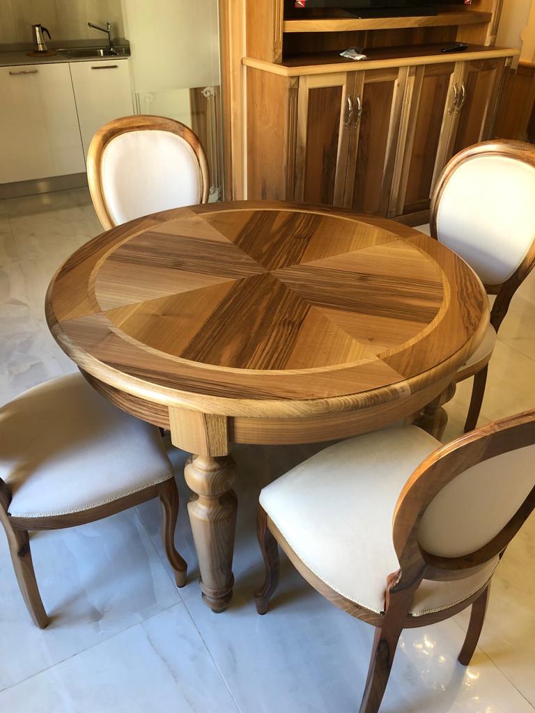 tavoli rotondi in legno massello